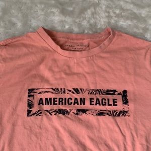 Men’s XS American Eagle shirt, salmon, pink with floral pattern.